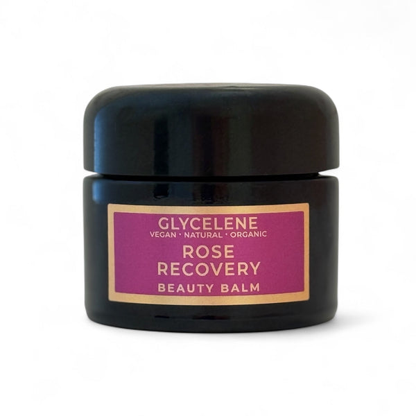 Black jar of Glycelene Rose Recovery Beauty Balm on a white background