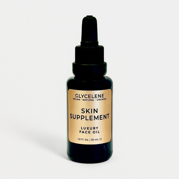 Bottle of Glycelelene skin supplement luxury face oil on a white background